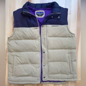 Men’s size L down filled tan and blue vest, purple lining